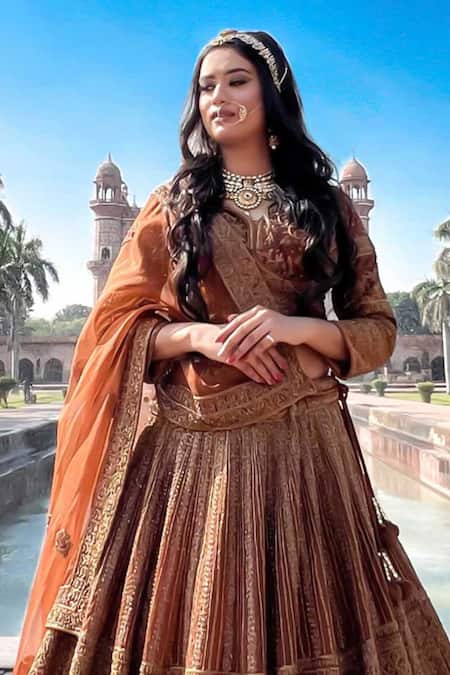 Amaltas Couture_Rust Organza Embroidery, Zari Round Neck Brown Zardozi Lehenga Set _Online_at_Aza_Fashions