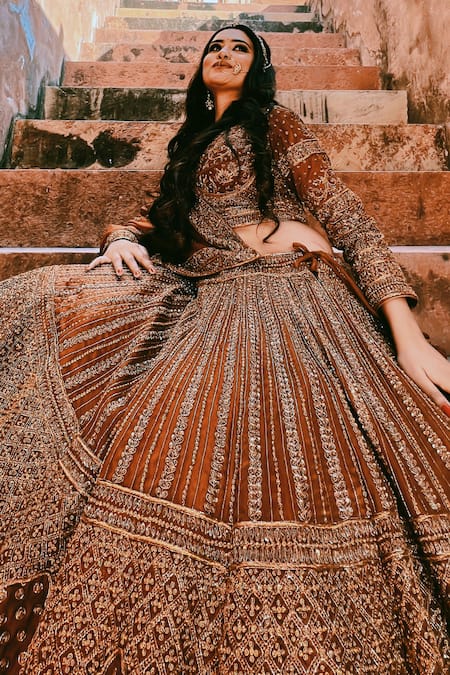 Amaltas Couture_Rust Organza Embroidery, Zari Round Neck Brown Zardozi Lehenga Set _at_Aza_Fashions