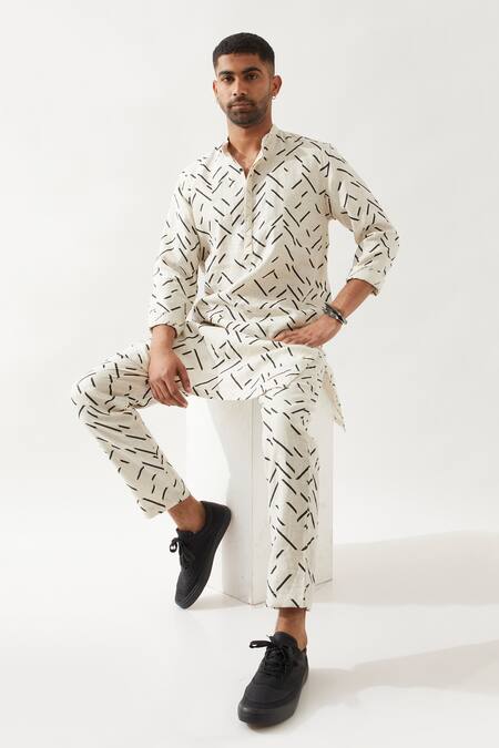 Buy Son Of A Noble Snob Ivory Linen Applique Printed Slim Fit Kurta Online at Aza Fashions Buy_Son Of A Noble Snob_Ivory Linen Applique Printed Slim Fit Kurta _Online_at_Aza_Fashions