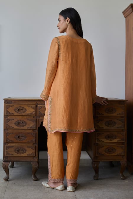 Shop_Rhua_Mustard Chanderi Metallic Thread, Mirrors V-neck Orange Kurta Set _at_Aza_Fashions