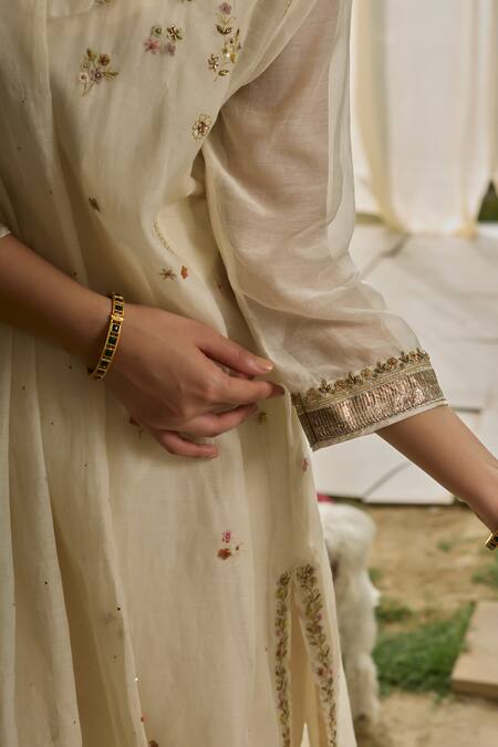 Rhua_White Chanderi Embroidery, Gota Patti, Mirrors Split V-neck Soft Kurta Set _at_Aza_Fashions