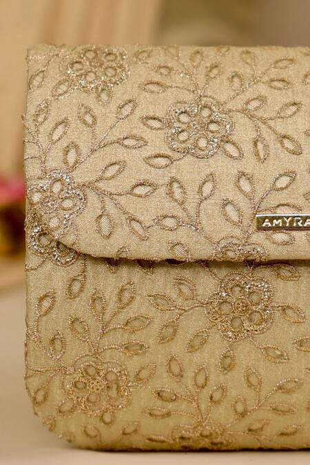 Buy_Amyra_Gold Embroidery, Cut Work Tarang Flapover Clutch - Light _Online_at_Aza_Fashions