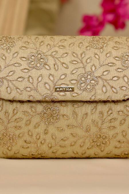Shop_Amyra_Gold Embroidery, Cut Work Tarang Flapover Clutch - Light _Online_at_Aza_Fashions