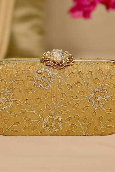 Shop Amyra Mustard Cut Work Tarang Capsule Clutch Online at Aza Fashions Shop_Amyra_Mustard Cut Work Tarang Capsule Clutch _Online_at_Aza_Fashions