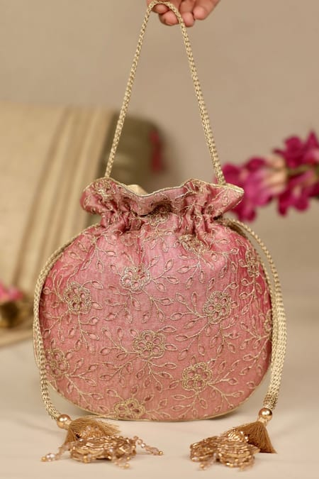 Buy_Amyra_Pink Embroidery, Tassels Tarang Cutwork Potli Bag_Online_at_Aza_Fashions