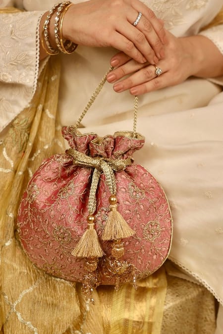 Amyra_Pink Embroidery, Tassels Tarang Cutwork Potli Bag_at_Aza_Fashions