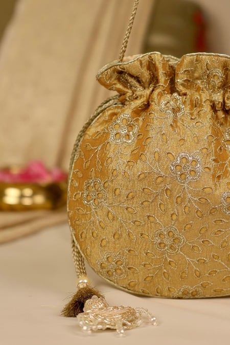 Amyra_Mustard Embroidery, Cut Work Tarang Potli Bag _Online_at_Aza_Fashions