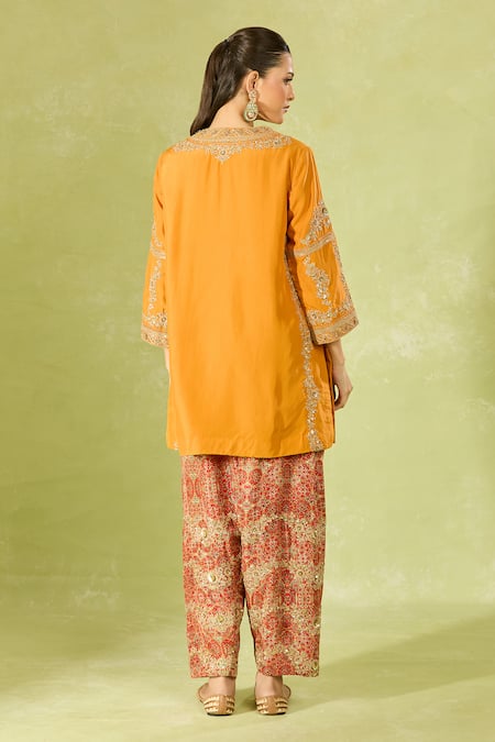Shop Debyani + CO Orange Silk Sequins Round Neck Embroidered Kurta Set at Aza Fashions Shop_Debyani + CO_Orange Silk Sequins Round Neck Embroidered Kurta Set _at_Aza_Fashions