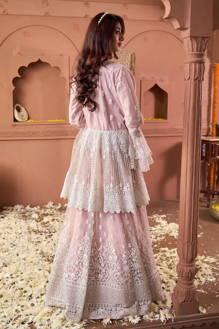 Tasuvure Indes Soft Pink Embroidered Peplum Tunic & Lehenga 