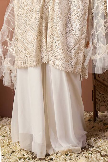 Tasuvure Indes_Ivory Net Sequins Collared Tunic And Skirt Set _Online_at_Aza_Fashions