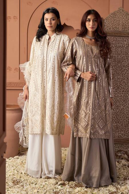 Shop_Tasuvure Indes_Ivory Net Sequins Collared Tunic And Skirt Set _Online_at_Aza_Fashions