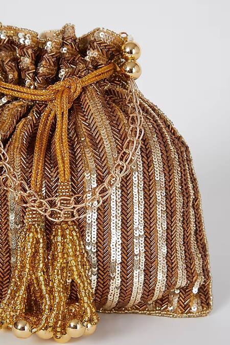 Buy_A Clutch Story_Gold Sequins, Tassels Antique Embroidered Potli _Online_at_Aza_Fashions