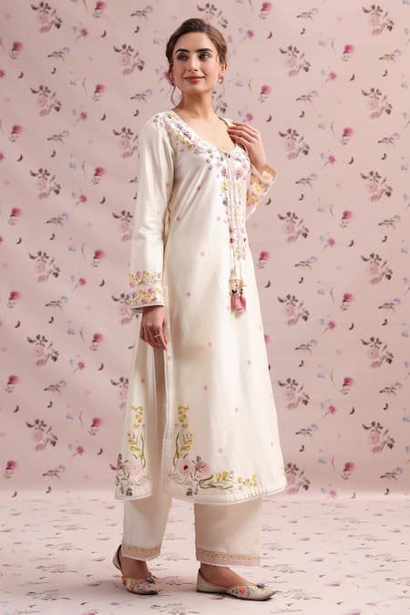 Label Niti Bothra_Ivory Silk, Chanderi Tassels Round Neck Printed Straight Kurta Set _at_Aza_Fashions