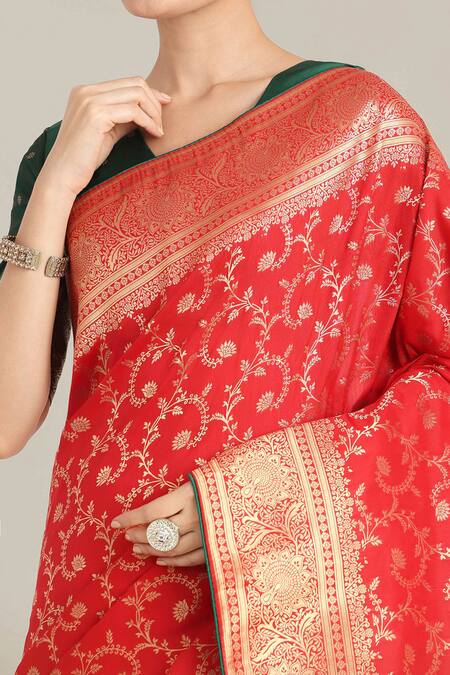 Naintara Bajaj Red Brocade, Silk Tassels V-neck Banarasi Saree And Blouse Set at Aza Fashions Naintara Bajaj_Red Brocade, Silk Tassels V-neck Banarasi Saree And Blouse Set _at_Aza_Fashions