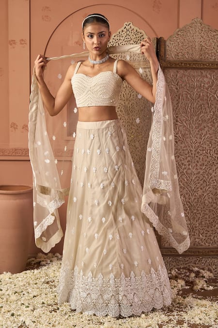 Tasuvure Indes_Beige Net Sequins, Embroidery Sweetheart Neck Lehenga Set _at_Aza_Fashions