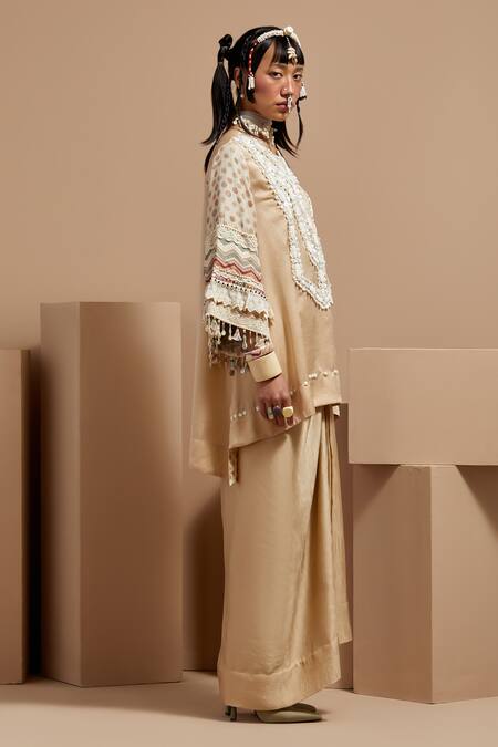 Aseem Kapoor Cream Silk Tassels High Neck Ecru Tribal Kurta Set at Aza Fashions Aseem Kapoor_Cream Silk Tassels High Neck Ecru Tribal Kurta Set _at_Aza_Fashions