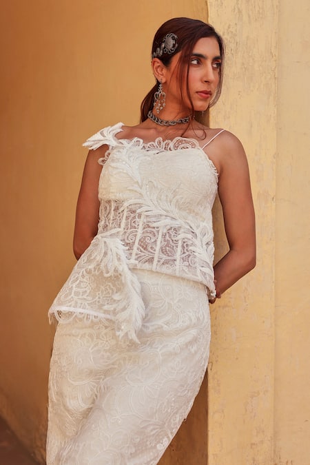 Label Moni K White Chantelle Lace Asymmetric Skirt And Top Set Online at Aza Fashions Label Moni K_White Chantelle Lace Asymmetric Skirt And Top Set _Online_at_Aza_Fashions