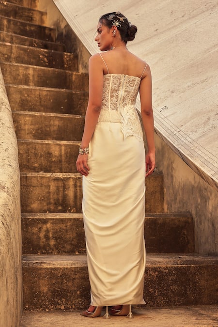 Shop Label Moni K White Satin Embroidery Sweetheart Neck Corset And Draped Skirt Set at Aza Fashions Shop_Label Moni K_White Satin Embroidery Sweetheart Neck Corset And Draped Skirt Set _at_Aza_Fashions