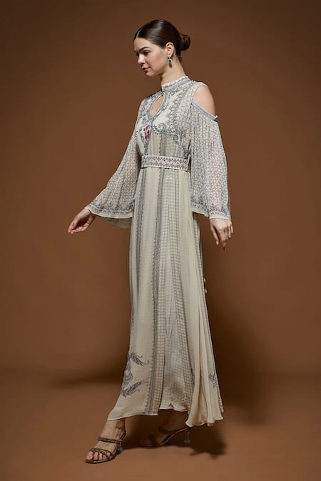 Nirraamyaa_Beige Georgette Rhinestones Keyhole Neck Embellished Maxi Dress _at_Aza_Fashions