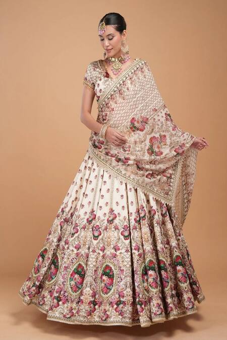 Shop Nirraamyaa Ivory Silk, Viscose, Satin, Organza Rhinestones, Embroidery Round Lehenga Set Online at Aza Fashions Shop_Nirraamyaa_Ivory Silk, Viscose, Satin, Organza Rhinestones, Embroidery Round Lehenga Set _Online_at_Aza_Fashions