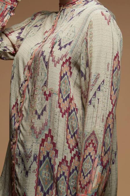 Nirraamyaa Beige Rhinestones Mandarin Collar Embellished Shirt at Aza Fashions Nirraamyaa_Beige Rhinestones Mandarin Collar Embellished Shirt _at_Aza_Fashions