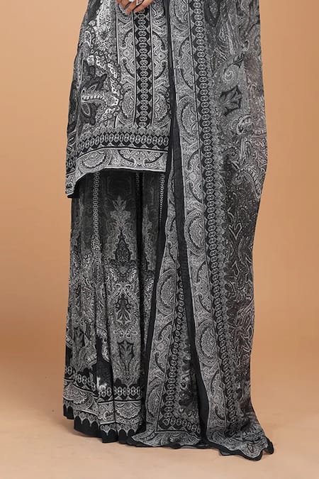 Nirraamyaa Black Georgette, Viscose Rhinestones Keyhole Neck Embroidered Kurta Set at Aza Fashions Nirraamyaa_Black Georgette, Viscose Rhinestones Keyhole Neck Embroidered Kurta Set _at_Aza_Fashions