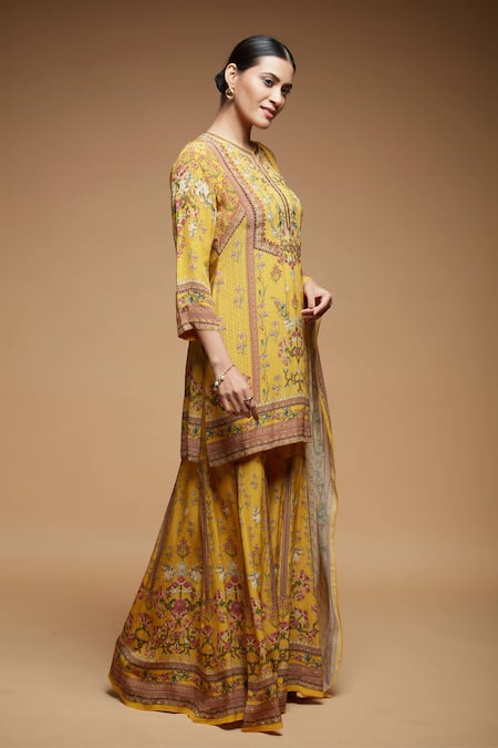 Nirraamyaa Mustard Brocade, Georgette Rhinestones Split V-neck Yellow Kurta Sharara Set Online at Aza Fashions Nirraamyaa_Mustard Brocade, Georgette Rhinestones Split V-neck Yellow Kurta Sharara Set _Online_at_Aza_Fashions