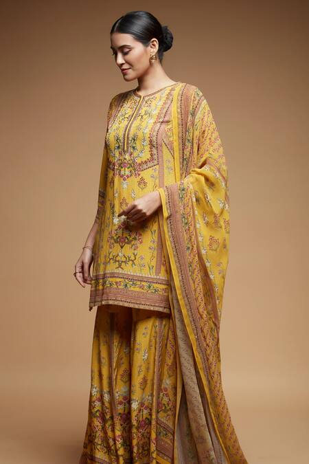 Buy Nirraamyaa Mustard Brocade, Georgette Rhinestones Split V-neck Yellow Kurta Sharara Set Online at Aza Fashions Buy_Nirraamyaa_Mustard Brocade, Georgette Rhinestones Split V-neck Yellow Kurta Sharara Set _Online_at_Aza_Fashions