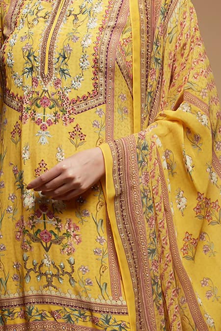 Nirraamyaa Mustard Brocade, Georgette Rhinestones Split V-neck Yellow Kurta Sharara Set at Aza Fashions Nirraamyaa_Mustard Brocade, Georgette Rhinestones Split V-neck Yellow Kurta Sharara Set _at_Aza_Fashions