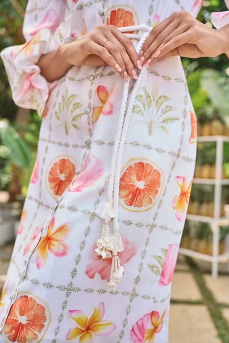 Verano By Tanya White Cotton, Linen Tassels Collared Floral Print Midi Dress With Belt Online at Aza Fashions Verano By Tanya_White Cotton, Linen Tassels Collared Floral Print Midi Dress With Belt _Online_at_Aza_Fashions