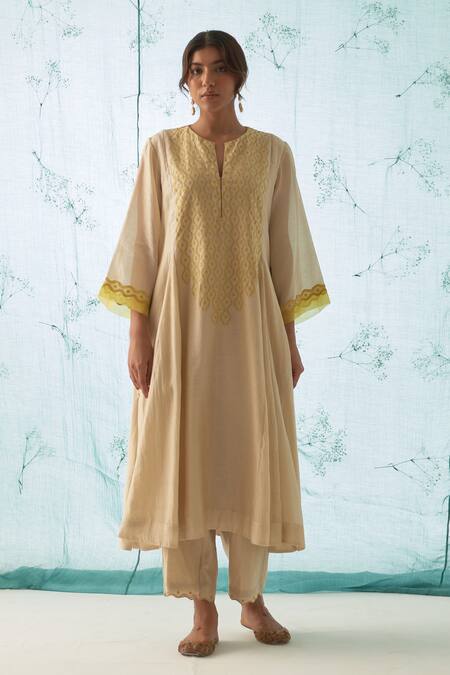 Shop Janki India Ivory Chanderi, Organza Embroidery Split V-neck Kurta Set With Yellow Online at Aza Fashions Shop_Janki India_Ivory Chanderi, Organza Embroidery Split V-neck Kurta Set With Yellow _Online_at_Aza_Fashions