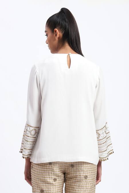Shop Abraham And Thakore White Crepe Zari Round Neck Tribal Embroidery Top at Aza Fashions Shop_Abraham And Thakore_White Crepe Zari Round Neck Tribal Embroidery Top_at_Aza_Fashions
