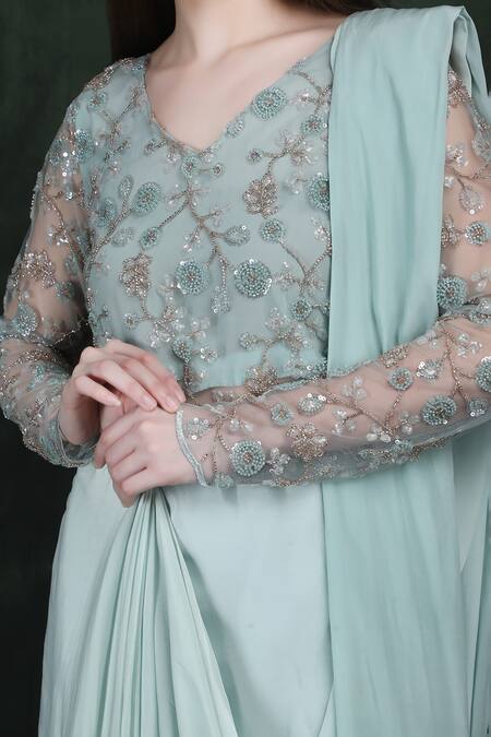Label Ivish_Blue Silk, Net Beads, Sequins V-neck Hand Embroidered Draped Saree Gown _at_Aza_Fashions