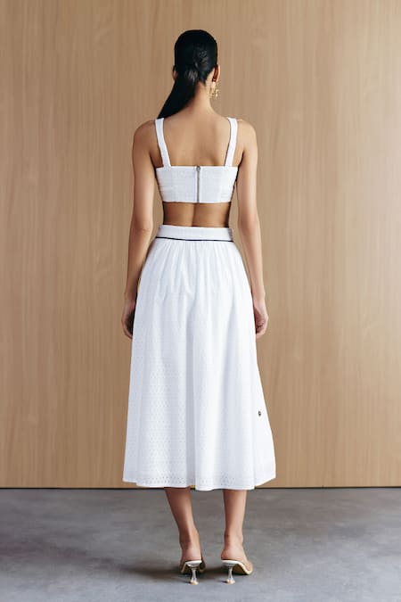 Shop Mellowdrama White Cotton Embroidery V-neck Schiffli Bralette And Skirt Set at Aza Fashions Shop_Mellowdrama_White Cotton Embroidery V-neck Schiffli Bralette And Skirt Set_at_Aza_Fashions