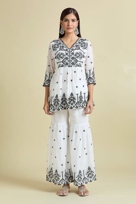 Naintara Bajaj_White Cotton Embroidery, Mirrors V-neck Work Peplum Kurta Sharara Set _Online_at_Aza_Fashions