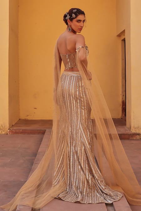 Shop Label Moni K Gold Net, Chanderi Sequins, Embroidery, Beads Sweetheart Neck Fusion Lehenga Set at Aza Fashions Shop_Label Moni K_Gold Net, Chanderi Sequins, Embroidery, Beads Sweetheart Neck Fusion Lehenga Set _at_Aza_Fashions