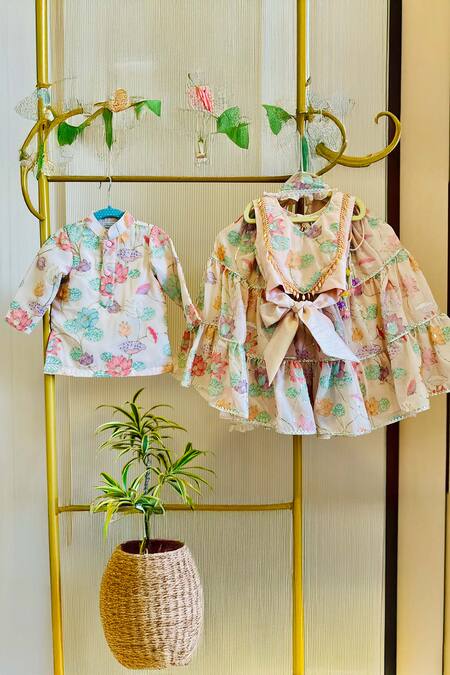 Shop_Rage Attire-Sweta Saria_Peach Viscose, Georgette Beads, Tassels Pastel Flower Tiered Lehenga Set_Online_at_Aza_Fashions