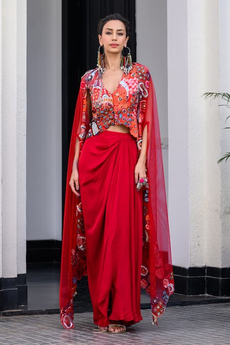 Juhi Bengani Red Silk Satin, Net Embroidery V-neck Cape And Dhoti Skirt Set at Aza Fashions Juhi Bengani_Red Silk Satin, Net Embroidery V-neck Cape And Dhoti Skirt Set _at_Aza_Fashions