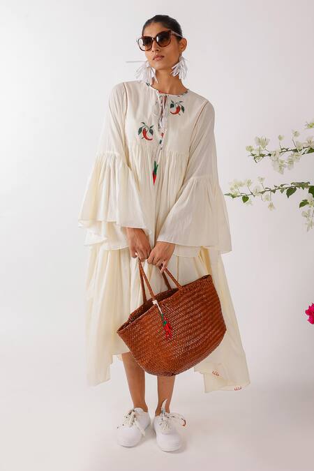 Buy Nikasha Cream Cotton Embroidery Round Neck Asymmetric Chilly Dress Online at Aza Fashions Buy_Nikasha_Cream Cotton Embroidery Round Neck Asymmetric Chilly Dress _Online_at_Aza_Fashions