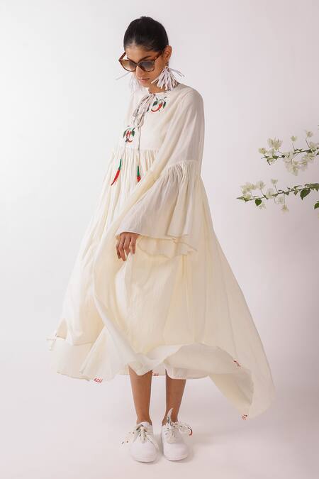 Nikasha Cream Cotton Embroidery Round Neck Asymmetric Chilly Dress at Aza Fashions Nikasha_Cream Cotton Embroidery Round Neck Asymmetric Chilly Dress _at_Aza_Fashions