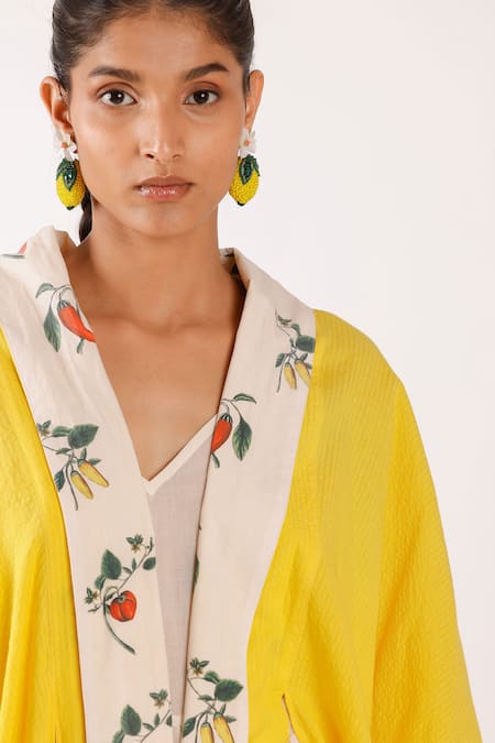 Nikasha Yellow Cotton Shawl Neck Chilly Print Shrug Online at Aza Fashions Nikasha_Yellow Cotton Shawl Neck Chilly Print Shrug _Online_at_Aza_Fashions