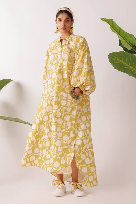Nikasha Yellow Cotton Round Neck Pomegranate Print Maxi Dress at Aza Fashions Nikasha_Yellow Cotton Round Neck Pomegranate Print Maxi Dress _at_Aza_Fashions