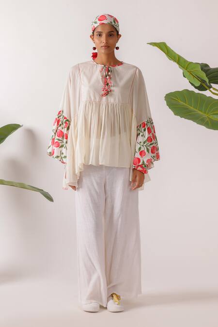 Nikasha Ivory Cotton Round Neck Pomegranate Print Mulmul Top Online at Aza Fashions Nikasha_Ivory Cotton Round Neck Pomegranate Print Mulmul Top _Online_at_Aza_Fashions