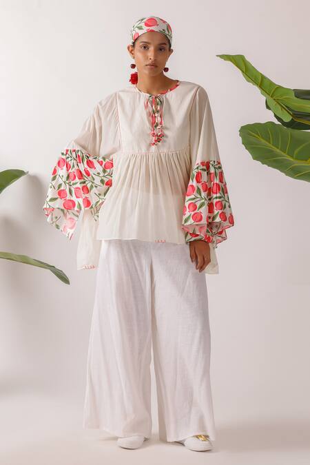Shop Nikasha Ivory Cotton Round Neck Pomegranate Print Mulmul Top Online at Aza Fashions Shop_Nikasha_Ivory Cotton Round Neck Pomegranate Print Mulmul Top _Online_at_Aza_Fashions