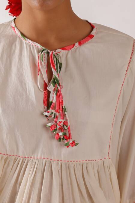 Nikasha Ivory Cotton Round Neck Pomegranate Print Mulmul Top at Aza Fashions Nikasha_Ivory Cotton Round Neck Pomegranate Print Mulmul Top _at_Aza_Fashions