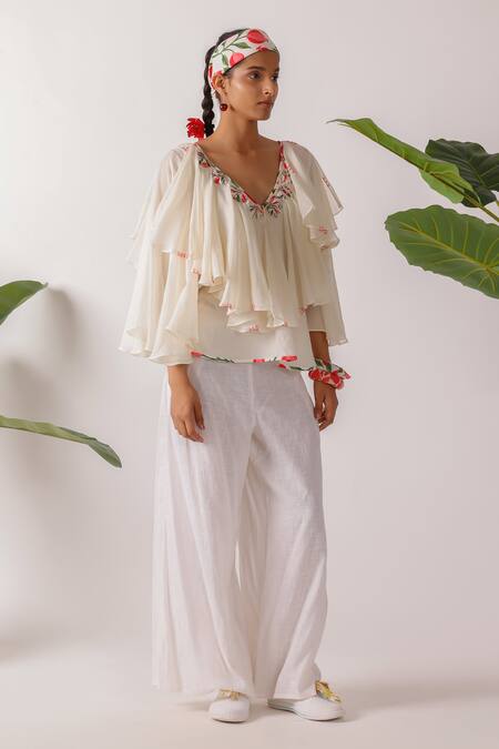 Shop_Nikasha_Ivory Cotton Embroidery V-neck Ruffle Top With Ribbon_Online_at_Aza_Fashions