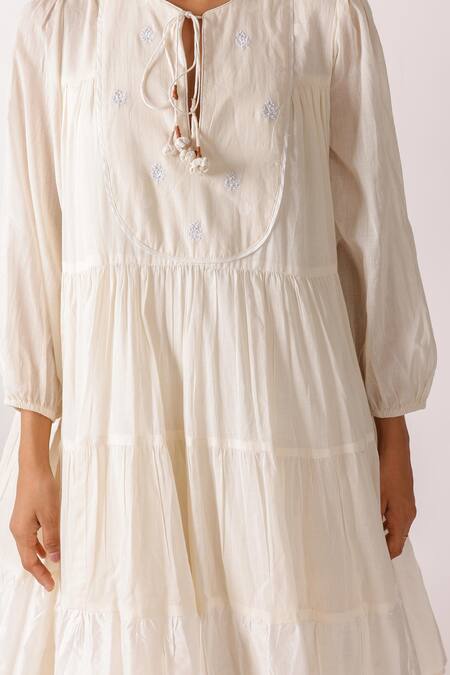 Nikasha Cream Cotton Fabric Flowers Round Neck Jamdani Embroidered Yoke Tier Dress Online at Aza Fashions Nikasha_Cream Cotton Fabric Flowers Round Neck Jamdani Embroidered Yoke Tier Dress_Online_at_Aza_Fashions