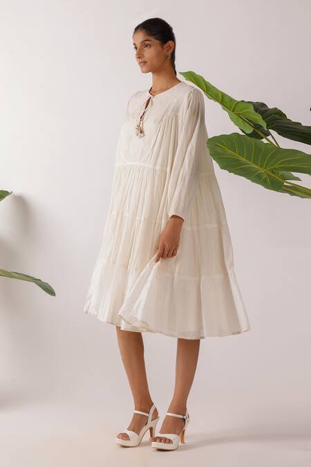 Buy Nikasha Cream Cotton Fabric Flowers Round Neck Jamdani Embroidered Yoke Tier Dress Buy_Nikasha_Cream Cotton Fabric Flowers Round Neck Jamdani Embroidered Yoke Tier Dress
