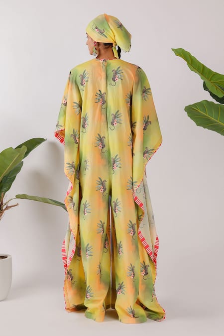 Shop Nikasha Yellow Cotton V-neck Leopard Print Kaftan at Aza Fashions Shop_Nikasha_Yellow Cotton V-neck Leopard Print Kaftan_at_Aza_Fashions