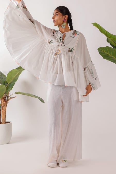 Nikasha_Ivory Cotton Embroidery Round Neck Hand Leopard Print Top_Online_at_Aza_Fashions